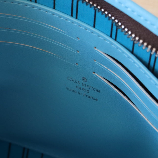 LV 25S POCHETTE VOYAGE 26 IN GASTON BLUE MONOGRAM MACASSAR COATED CANVAS