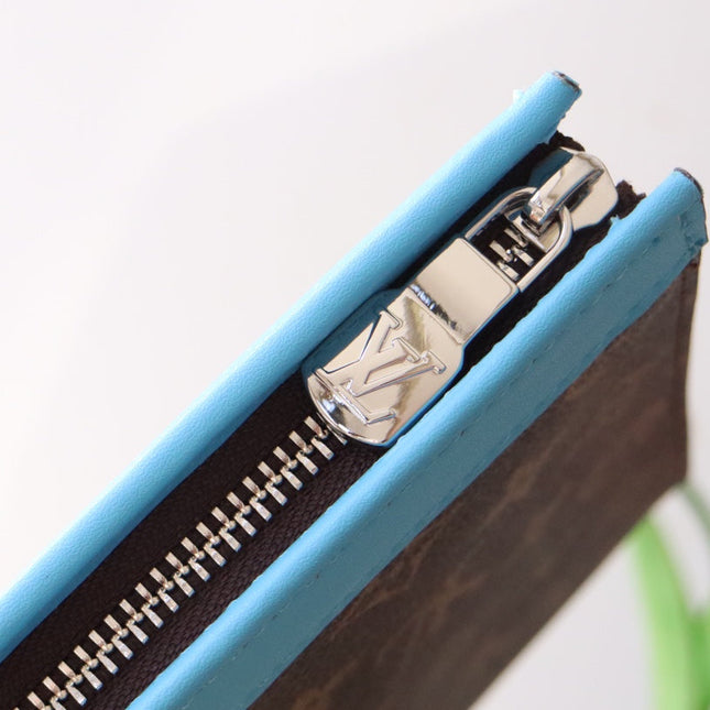 LV 25S POCHETTE VOYAGE 26 IN GASTON BLUE MONOGRAM MACASSAR COATED CANVAS