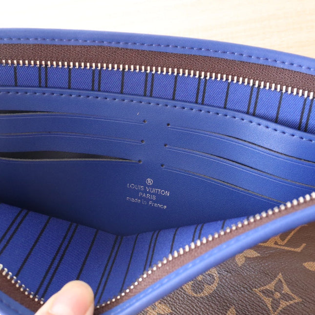 LV 25S POCHETTE VOYAGE 26 IN INDIGO BLUE MONOGRAM MACASSAR COATED CANVAS