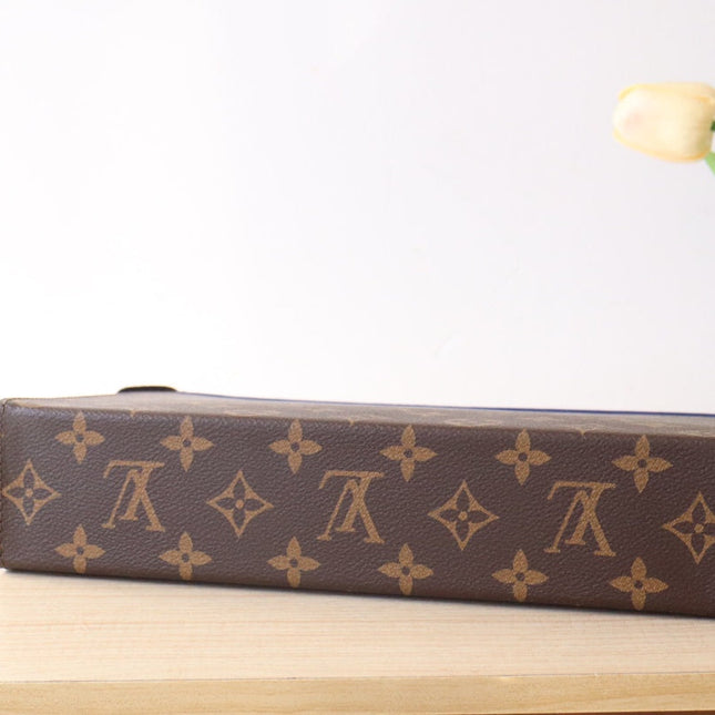 LV 25S POCHETTE VOYAGE 26 IN INDIGO BLUE MONOGRAM MACASSAR COATED CANVAS