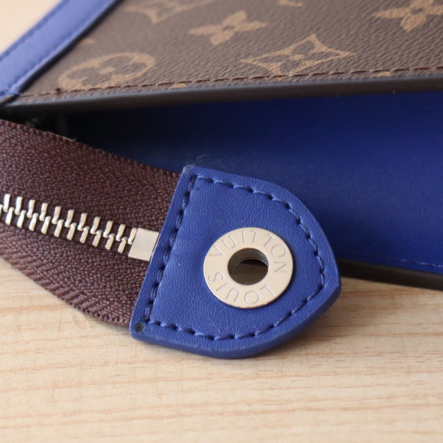 LV 25S POCHETTE VOYAGE 26 IN INDIGO BLUE MONOGRAM MACASSAR COATED CANVAS