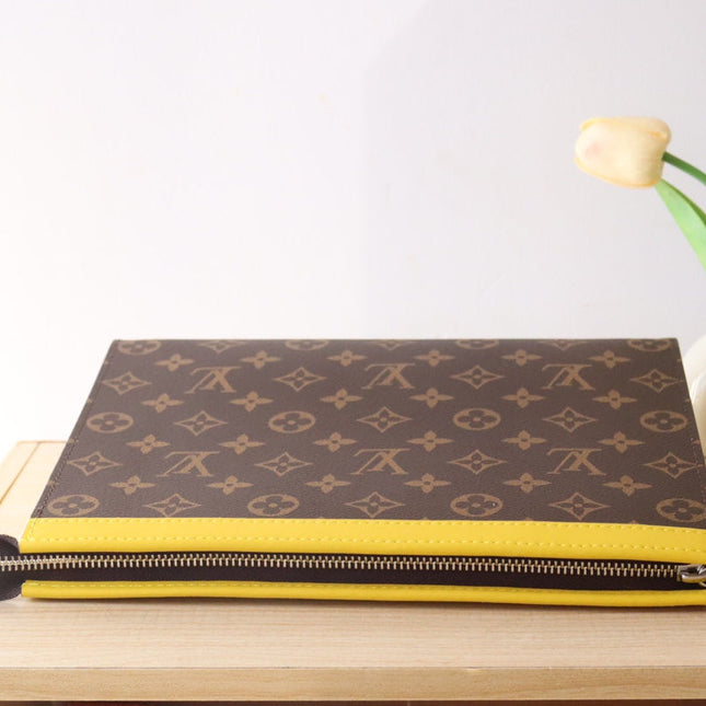 LV 25S POCHETTE VOYAGE 26 IN YELLOW MONOGRAM MACASSAR COATED CANVAS