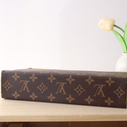 LV 25S POCHETTE VOYAGE 26 IN YELLOW MONOGRAM MACASSAR COATED CANVAS
