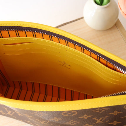 LV 25S POCHETTE VOYAGE 26 IN YELLOW MONOGRAM MACASSAR COATED CANVAS