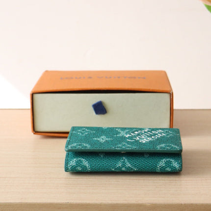 LV 25S ENVELOPE BUSINESS CARD HOLDER 10 IN DEEP TEAL MONOGRAM HERITAGE COATED CALFSKIN