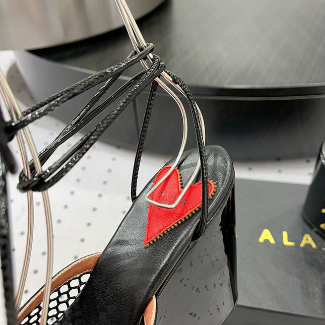 ALAIA BANQUET WEDGE SANDALS IN BLACK LAMBSKIN WITH RED HEART