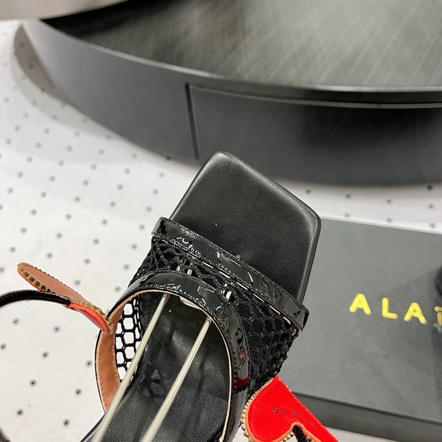 ALAIA BANQUET WEDGE SANDALS IN BLACK LAMBSKIN WITH RED HEART
