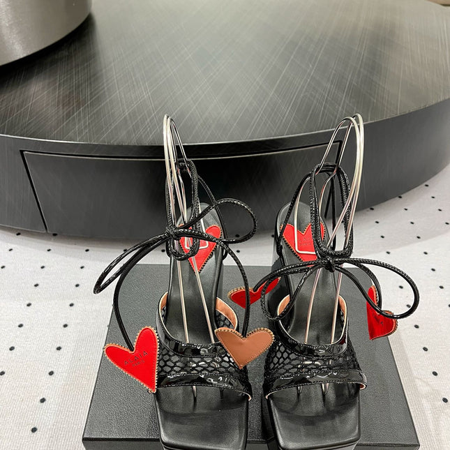ALAIA BANQUET WEDGE SANDALS IN BLACK LAMBSKIN WITH RED HEART