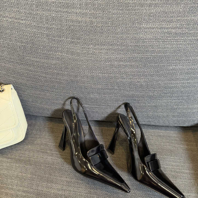 POINTED-TOE SLINGBACK PUMPS IN BLACK SHINY CALFSKIN