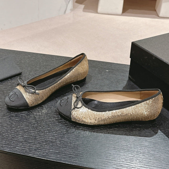 BALLET FLATS IN GOLDEN GLITTERED TULLE AND BLACK SATIN