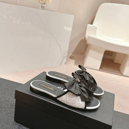 BOW LADY SLIPPERS BLACK LAMBSKIN WITH WHITE RHINESTONES