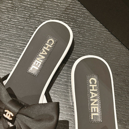 BOW LADY SLIPPERS BLACK LAMBSKIN WITH WHITE RHINESTONES