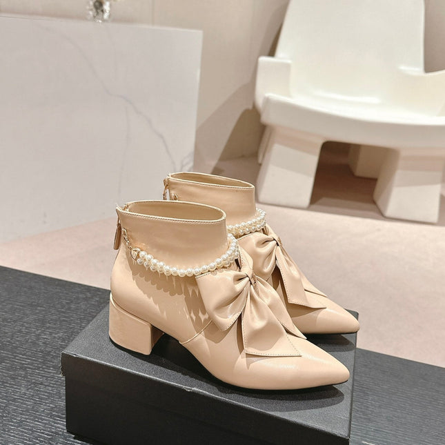 SHORT BOOTS IN BISQUE CREAM SHEEPSKIN WITH BOW