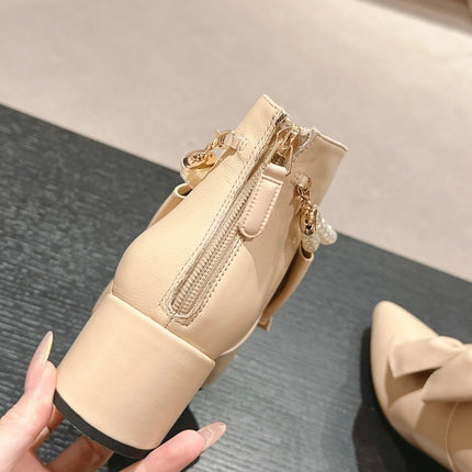 SHORT BOOTS IN BISQUE CREAM SHEEPSKIN WITH BOW