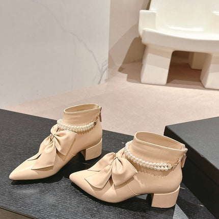 SHORT BOOTS IN BISQUE CREAM SHEEPSKIN WITH BOW