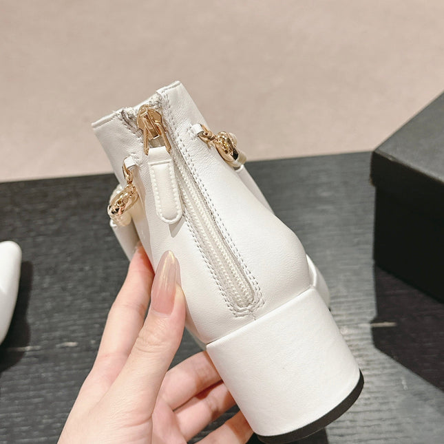 SHORT BOOTS IN WHITE SHEEPSKIN WITH BOW