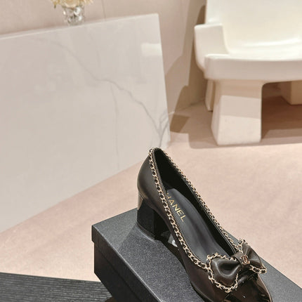 BOWKNOT HIGH HEELS IN BLACK SHEEPSKIN