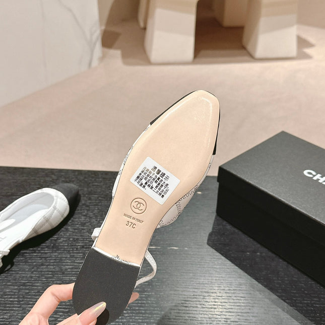 SLINGBACKS IN WHITE LAMBSKIN AND BLACK SATIN