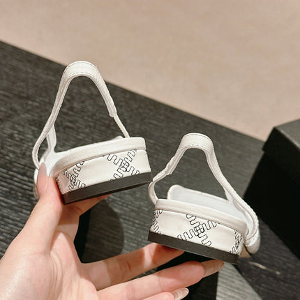 SLINGBACKS IN WHITE LAMBSKIN AND BLACK SATIN