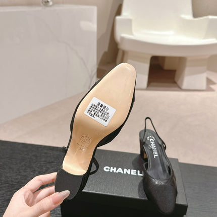 HIGH SLINGBACKS IN BLACK LAMBSKIN AND SATIN