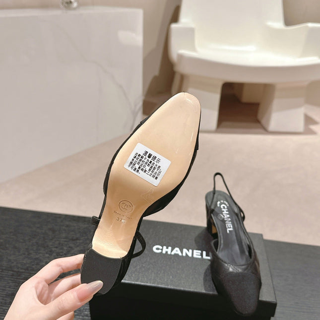 HIGH SLINGBACKS IN BLACK LAMBSKIN AND SATIN