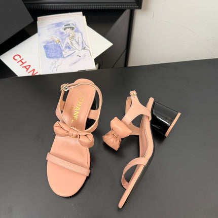 MID HEEL SANDALS IN PEACHY PINK CALFSKIN WITH BOW