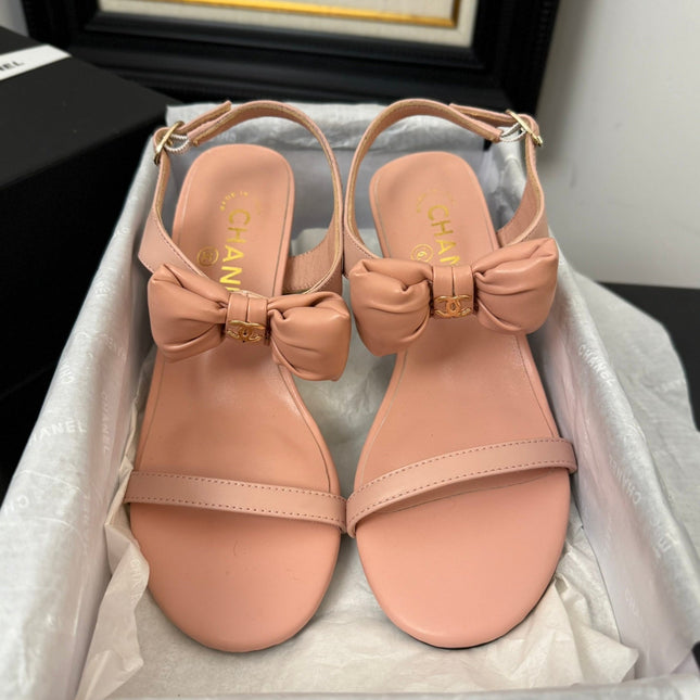 MID HEEL SANDALS IN PEACHY PINK CALFSKIN WITH BOW
