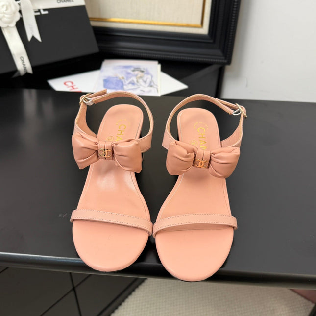 MID HEEL SANDALS IN PEACHY PINK CALFSKIN WITH BOW