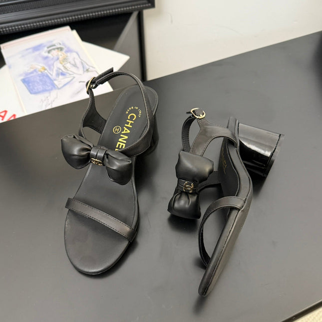 MID HEEL SANDALS IN BLACK CALFSKIN WITH BOW