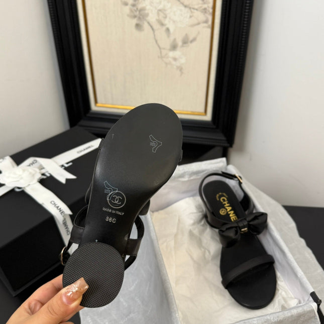 MID HEEL SANDALS IN BLACK CALFSKIN WITH BOW