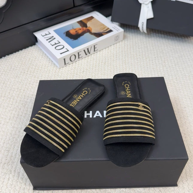 FLAT SLIDE IN BLACK SUEDE WITH GOLD CRYSTALS