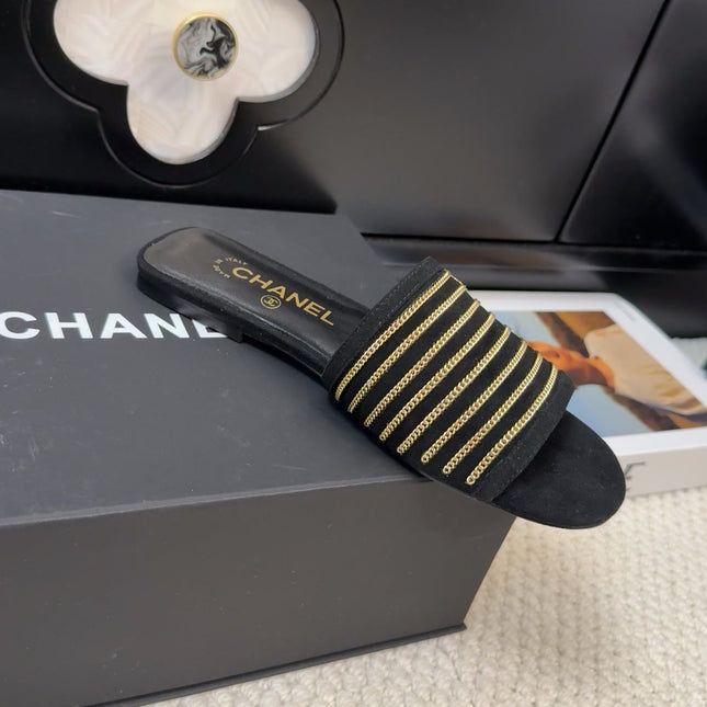 FLAT SLIDE IN BLACK SUEDE WITH GOLD CRYSTALS