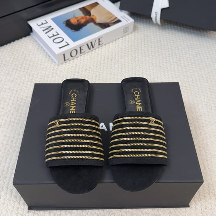 FLAT SLIDE IN BLACK SUEDE WITH GOLD CRYSTALS