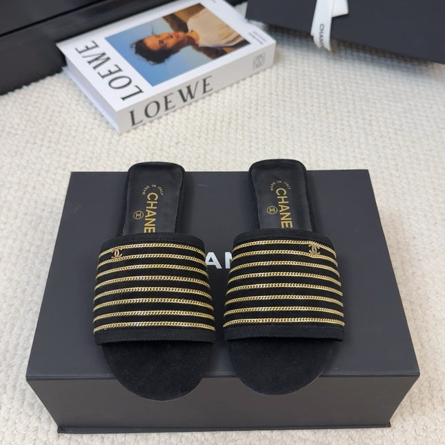 FLAT SLIDE IN BLACK SUEDE WITH GOLD CRYSTALS