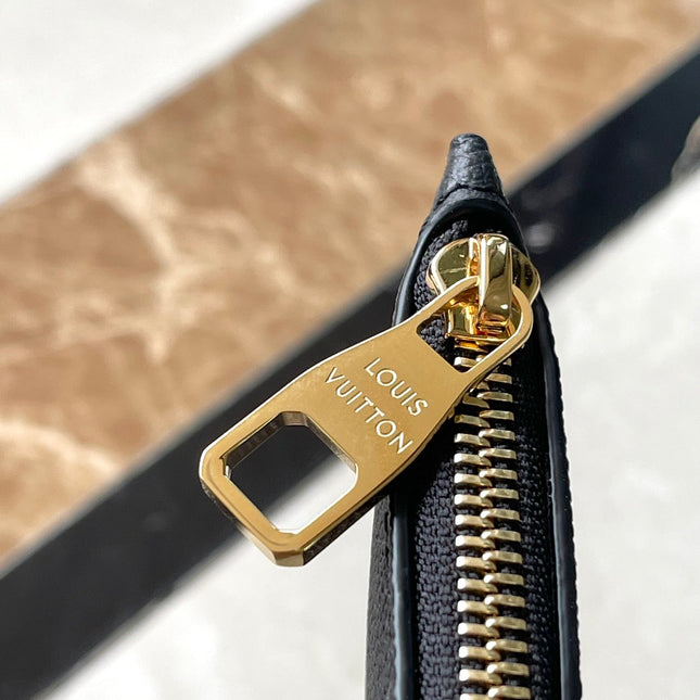 NEVERFULL MM 31 IN BLACK CREAM MONOGRAM EMPREINTE LEATHER