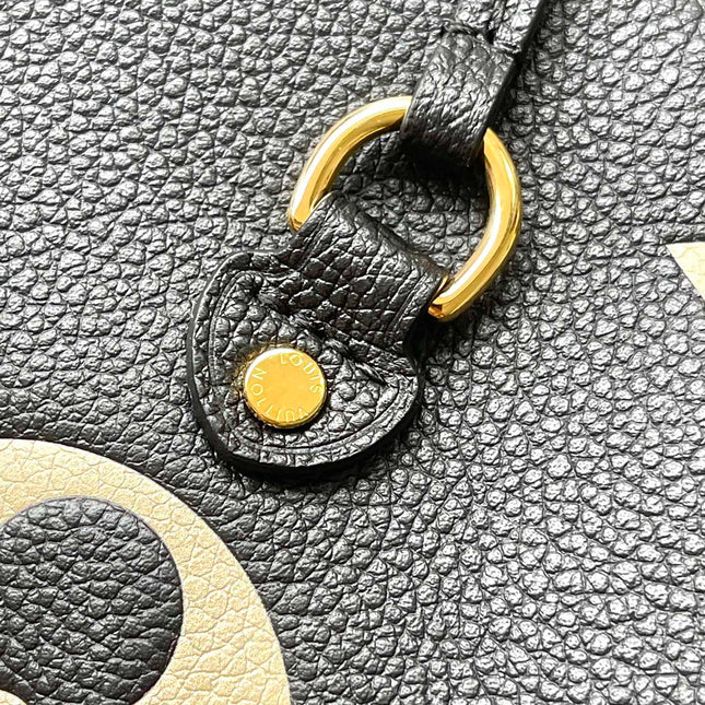 NEVERFULL MM 31 IN BLACK CREAM MONOGRAM EMPREINTE LEATHER