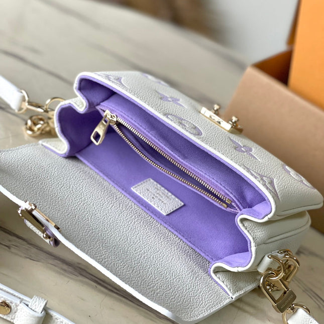 POCHETTE METIS EAST WEST 21 IN WHITE PURPLE MONOGRAM EMPREINTE LEATHER