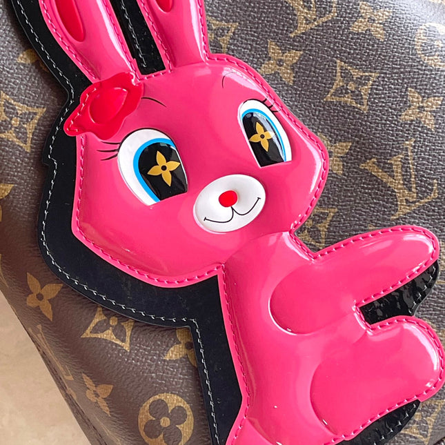 NEVERFULL MM 31 IN BROWN MONOGRAM CANVAS WITH PINK RABBIT PATCH