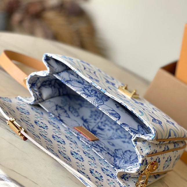 POCHETTE MÉTIS 25 IN LAGOON BLUE MONOGRAM TILES CANVAS GOLD HARDWARE