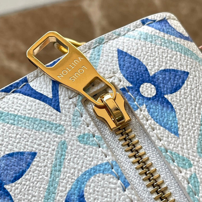 POCHETTE MÉTIS 25 IN LAGOON BLUE MONOGRAM TILES CANVAS GOLD HARDWARE