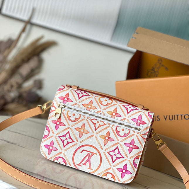 POCHETTE MÉTIS 25 IN CORAL MONOGRAM TILES CANVAS GOLD HARDWARE