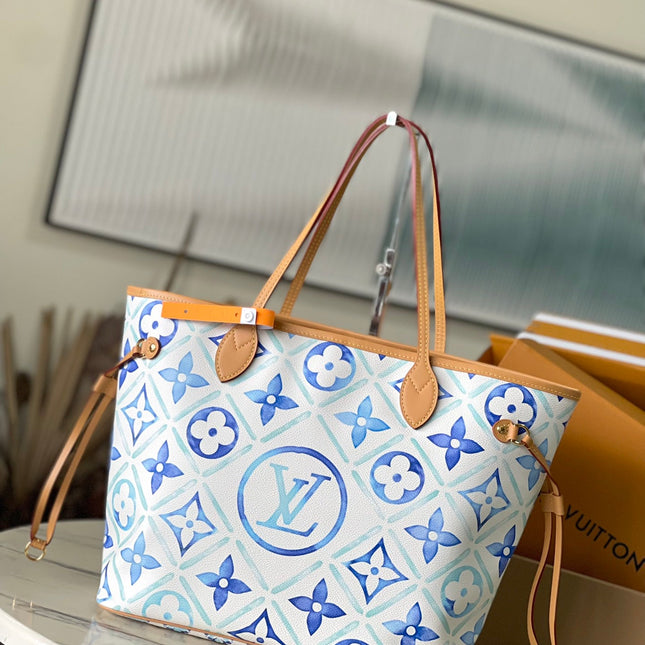 NEVERFULL MM 31 IN LAGOON BLUE MONOGRAM TILES CANVAS