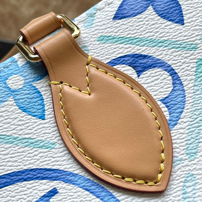 ONTHEGO EAST WEST 25 IN LAGOON BLUE MONOGRAM TILES CANVAS