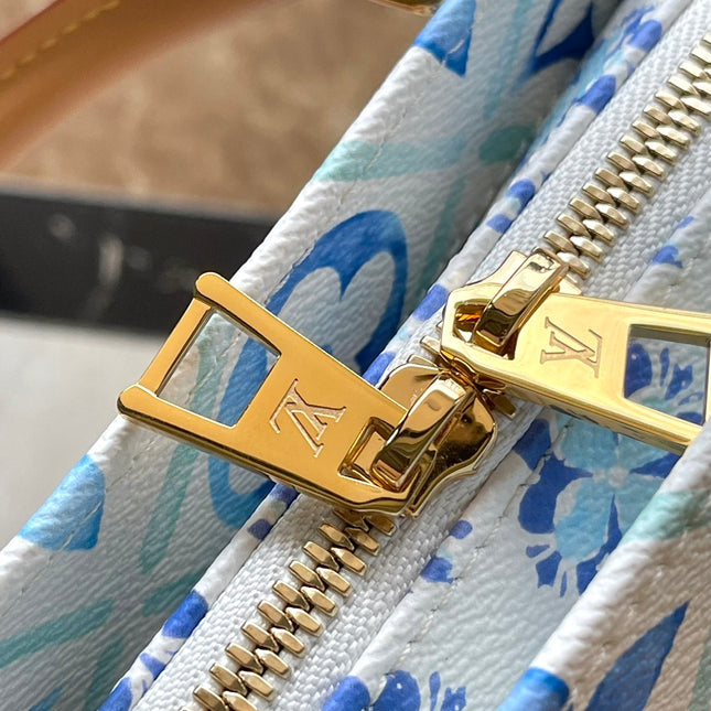 ONTHEGO EAST WEST 25 IN LAGOON BLUE MONOGRAM TILES CANVAS