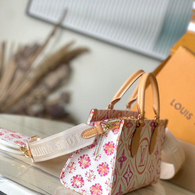 ONTHEGO EAST WEST 25 IN CORAL MONOGRAM TILES CANVAS