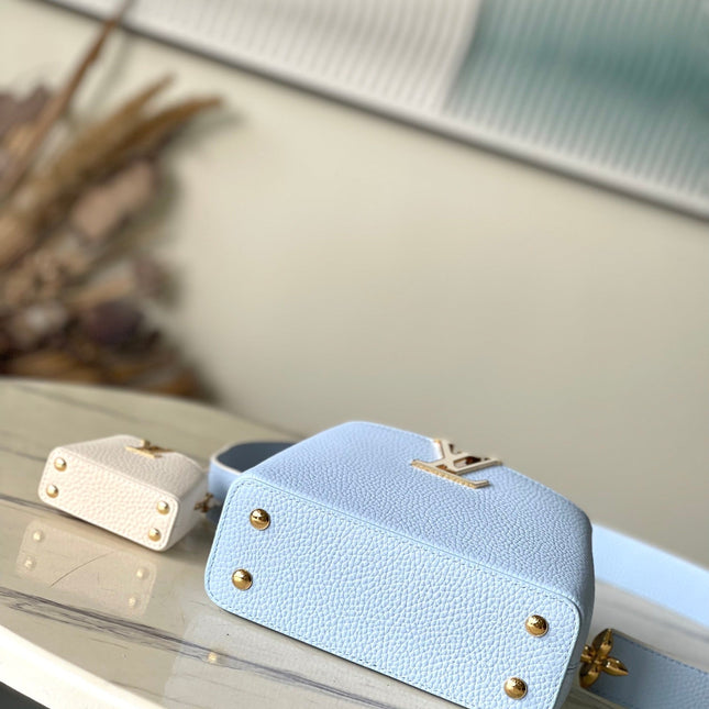 CAPUCINES MINI 21 IN CANDY BLUE TAURILLON GOLD HARDWARE