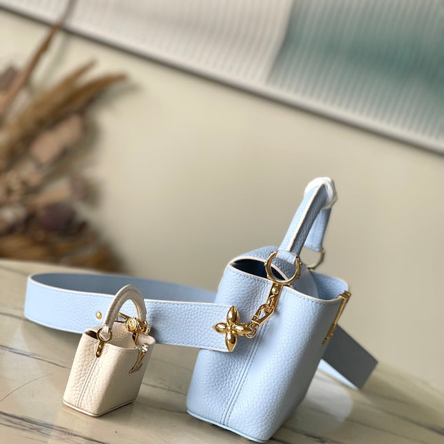 CAPUCINES MINI 21 IN CANDY BLUE TAURILLON GOLD HARDWARE