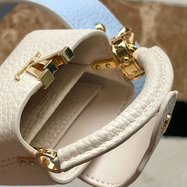 CAPUCINES MINI 21 IN CANDY BLUE TAURILLON GOLD HARDWARE