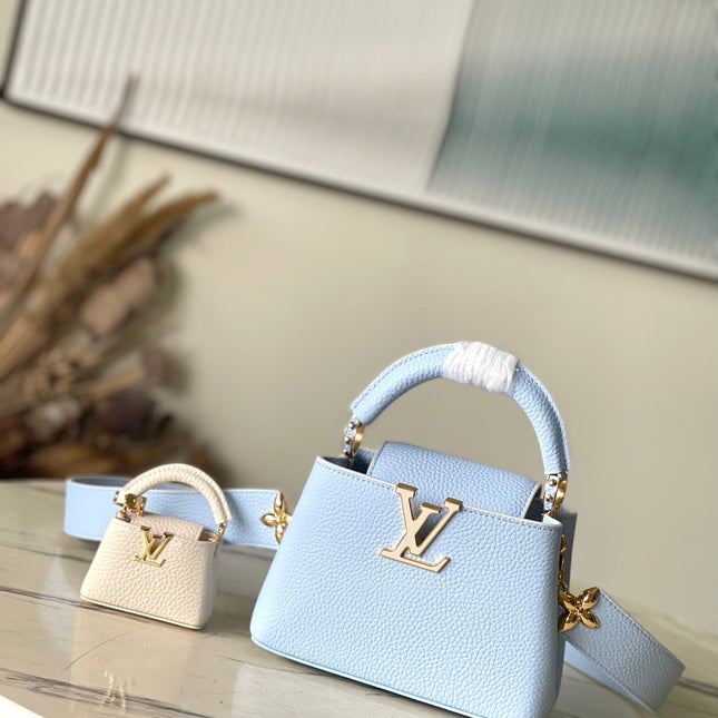 CAPUCINES MINI 21 IN CANDY BLUE TAURILLON GOLD HARDWARE
