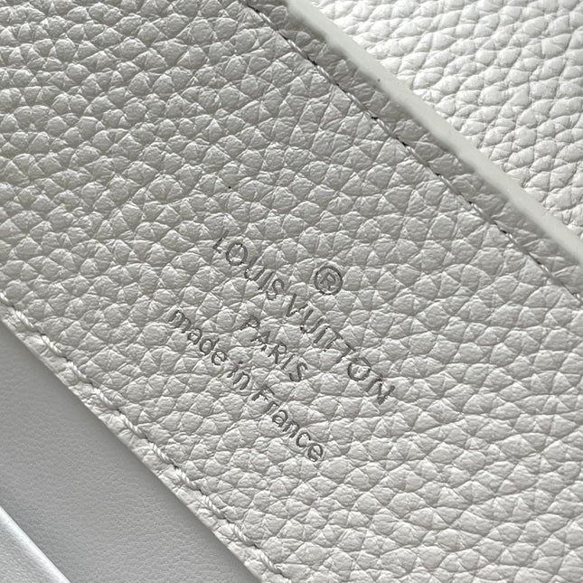 CAPUCINES EAST-WEST 33 IN WHITE CALFSKIN SILVER HARDWARE